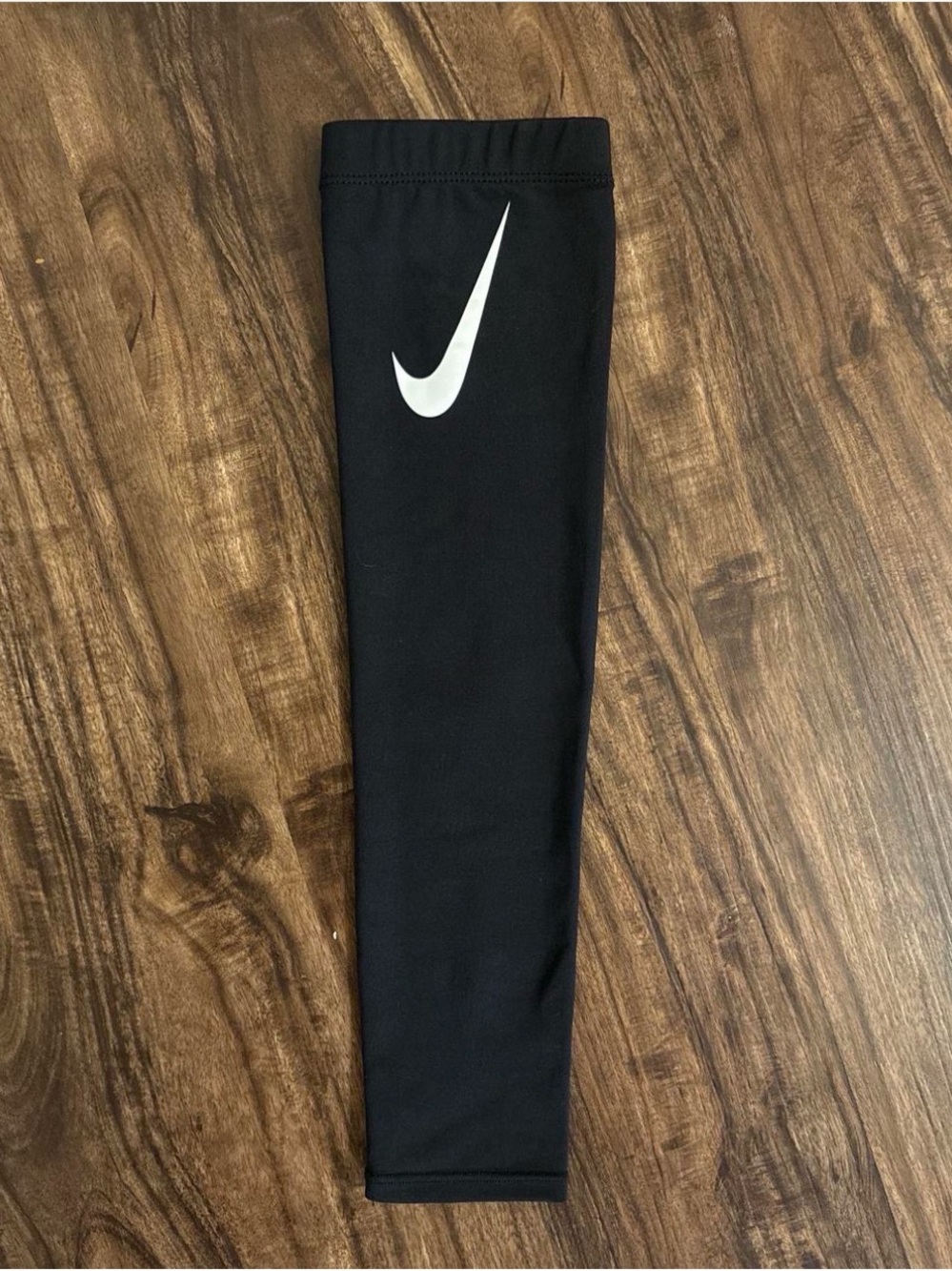 Nike Black arm band with White Swoosh